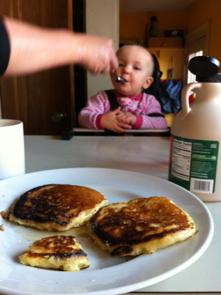 Feeding baby pancakes